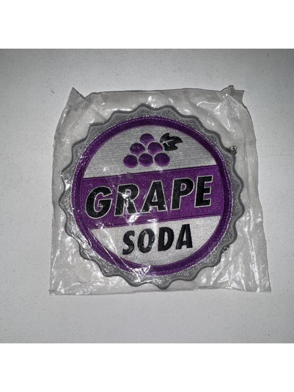 Disney Harveys seatbelt coin purse up grape soda pin
